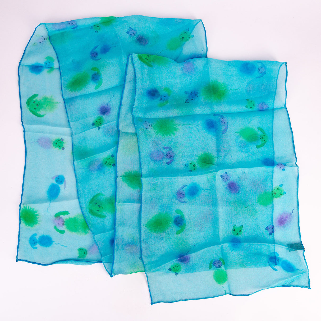 blue mesh scarf with illustrations of dogs and cats